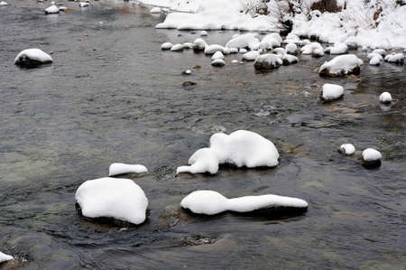 Le Gardon snowy river in the French region of Cevennes and the Gard department next to Anduzeの写真素材