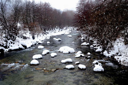 the Gardon snowy river in the French region of Cevennes and the Gard department next to Anduzeの写真素材