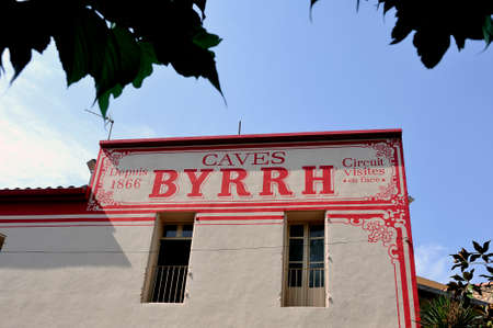 Old advertisement on the old frontage of the Byrrh company in Thuir making the famous world-famous...