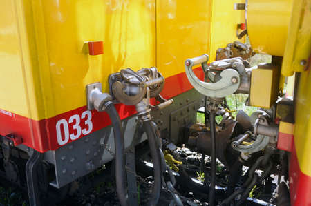 Fastening system of the wagons of the little yellow train in close up