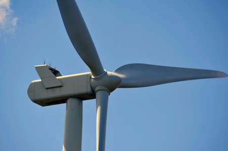 wind turbines close-up on propellers on blue sky background