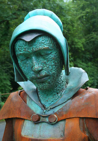 Statue of one of the Pendle Witches walking to the witch trials in Lancasterの写真素材