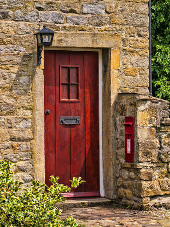 Post office door in the village of Wycoller Lancashireのeditorial素材
