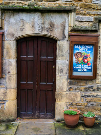 Church house Grassington main street Yorkshire dated 1694のeditorial素材