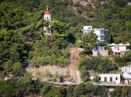 Olympian coastline buildings on the boat to Ithaca Greeceのeditorial素材