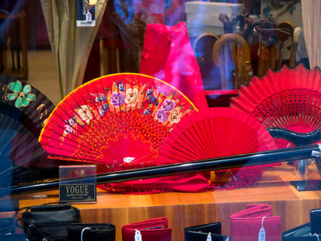 Traditional spanish flamenco fans displayed in a shop window in the city of Palma Majorca Spainのeditorial素材