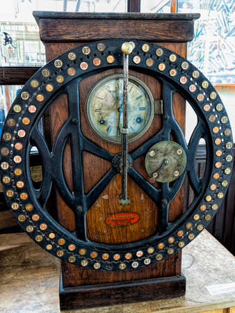 A clocking in machine from a Victorian factoryのeditorial素材