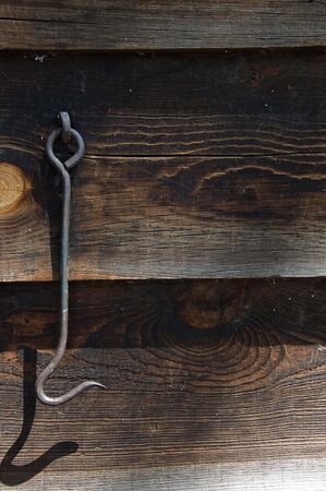Metal Hook on Wooden Doorの写真素材