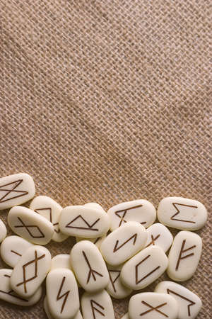 Runic stones, for astrological consultation, past, present and future.Image with copyspace on top.の写真素材