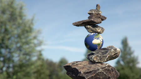 Rock balance in perfect equilibrium thanks to planet earth.の写真素材