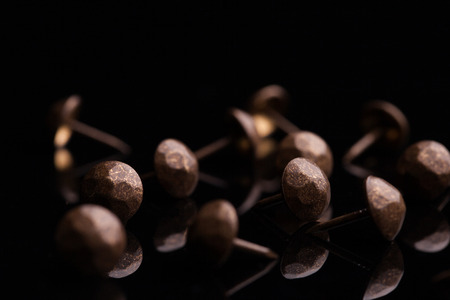 Studs trim upholstery vintage bronze on black reflection