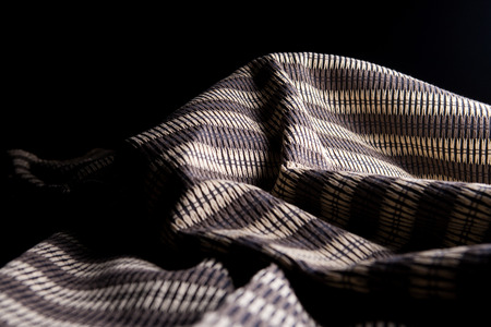 Upholstery fabrics reflection on black backgroundの写真素材