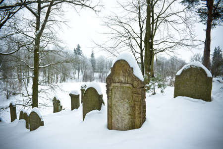 old Jewish cemetery  at winter timeの写真素材