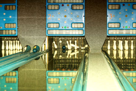 By the leisure pursuit Bowling at a skittle alley is rolling the ball and the skittleの写真素材