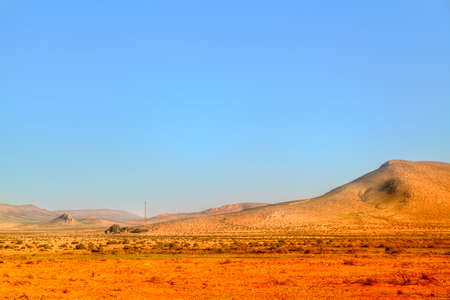 picturesqe landscape in the desert of Morocco in the near of Tan Tan in West Sahara with sand dunes in the backgroundの写真素材