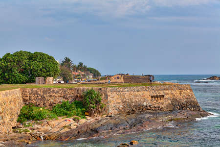 View to the mighty walls of the historical Galle Fortress on the tropical island Sri Lanka in Asia in the Indian Ocean with beautiful blue skyのeditorial素材