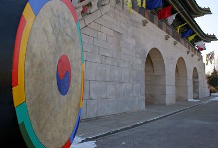 A drum at the entrance of Gyeongbokgung Palace, Seoul, South Koreaの写真素材