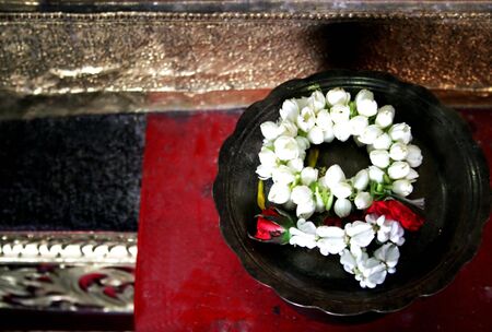 White flowers on an alter in Thailandの写真素材