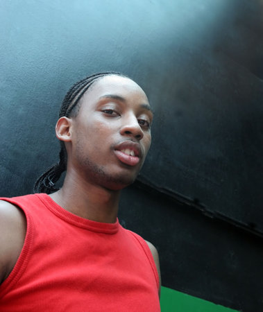 Portrait of a gorgeous young black man with a serious expressionの写真素材