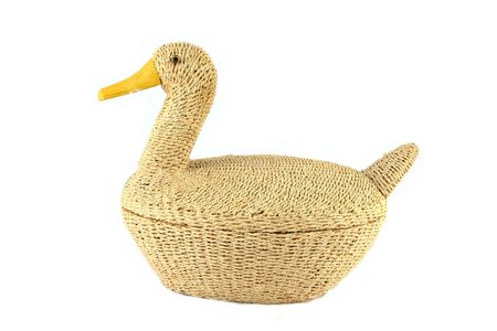 Duck made of cane material isolated on whiteの写真素材