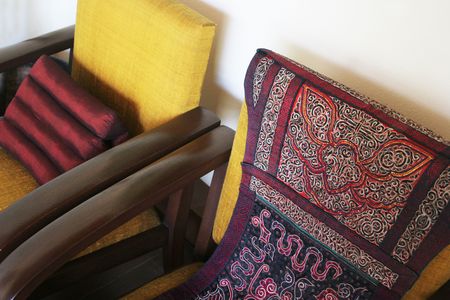 Two wooden oriental style chairs - home interiorsの写真素材