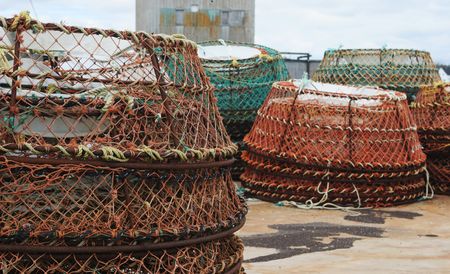 Fishing nets at a wharfの写真素材
