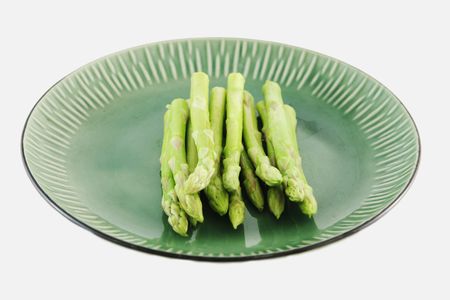Fresh asparagus shoots on a plate - healthy livingの写真素材