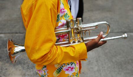 Close-up of a band member holding a trumpetの写真素材