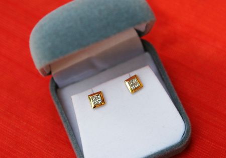 Gold earringsの写真素材