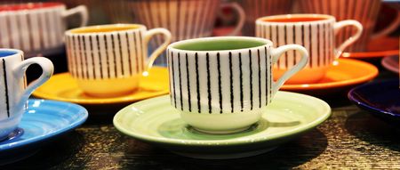 Bright pottery cups - home interiorsの写真素材