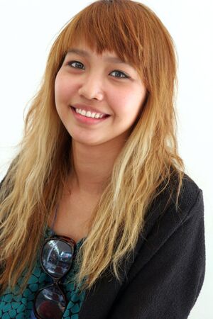 Portrait of a happy Thai girl.の写真素材