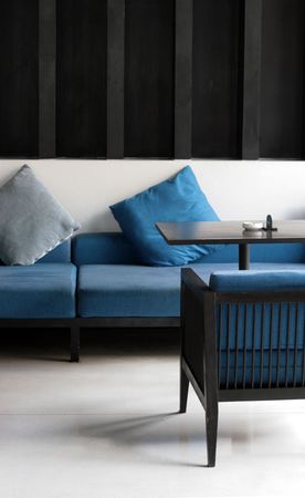 Chairs and sofa in a modern interior.の写真素材