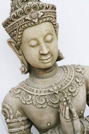 Traditional stone carved Thai statue - travel and tourism.