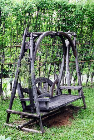 Wooden garden chair - home gardens and landscapes.の写真素材