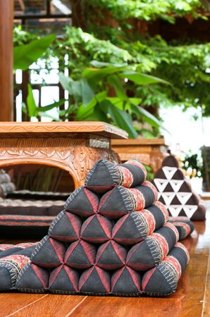 Thai pillows and furniture - travel and tourism.の写真素材