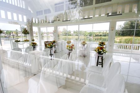 White wedding chapel decorated with beautiful flowers.のeditorial素材