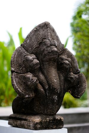 Statue in a garden - tropical Thailand.の写真素材