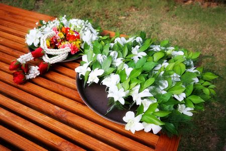Beautiful tropical flowers on a table.の写真素材