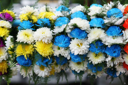 Colorful floral flower arrangement hanging at an event.の写真素材