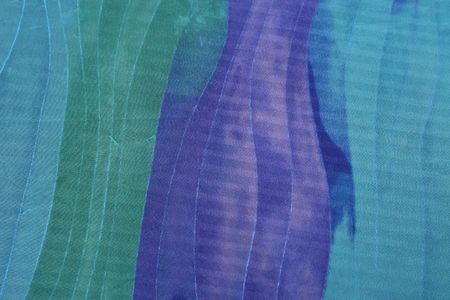 Close-up of blue silk fabric - abstract background.