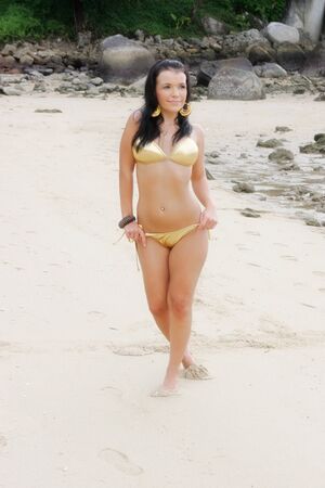 Beautiful young woman in a bikini.の写真素材