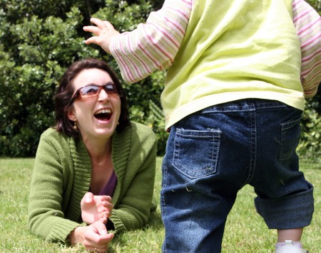 Portrait of a mother and daughter at the park.