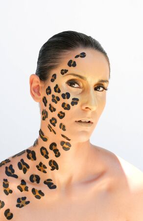 Woman with animal print make-up.の写真素材