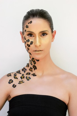 Woman with animal print make-up.の写真素材