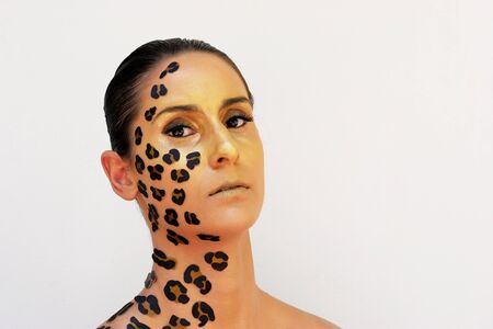 Woman with animal print make-up.の写真素材