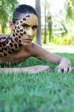 Woman with animal print make-up.