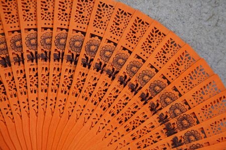 Close-up of a bright Asian fan.の写真素材
