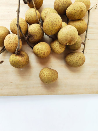 Longan fruit on wood background, Fresh longan on white background