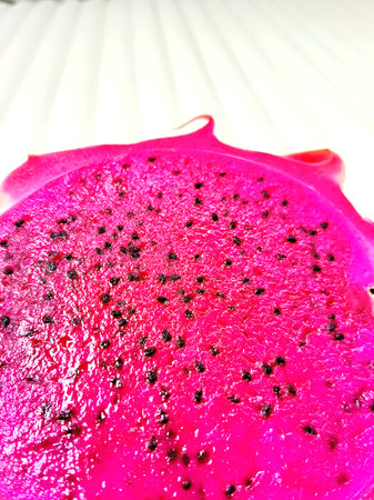 Dragon fruit on white background. Close up of dragon fruit slice.の写真素材