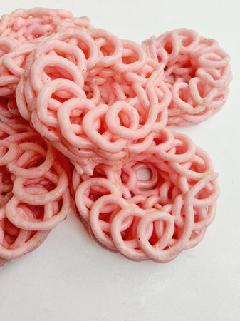 Textured Close-Up of a Stack of Pink Kerupuk